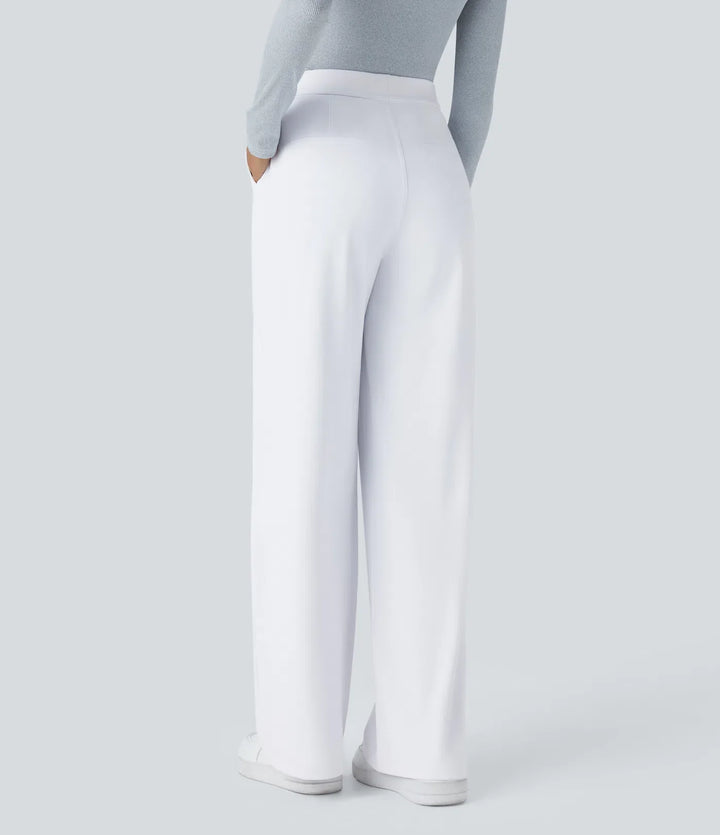 Vera – Pantalones Acampanados con Cremallera